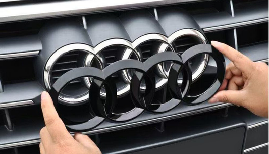 Before & After: How Gloss Black Full Emblem Set Transform the Presence of an Audi A6.